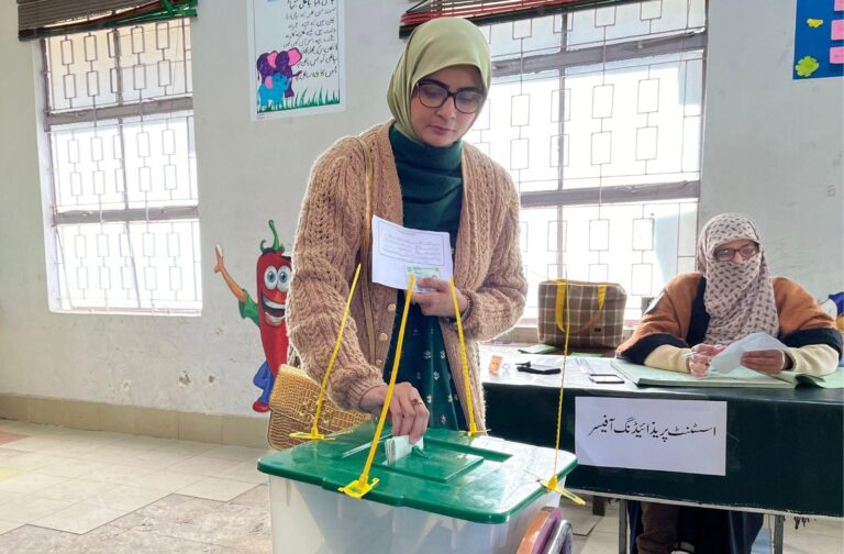 woman casting vote in pakistan election
